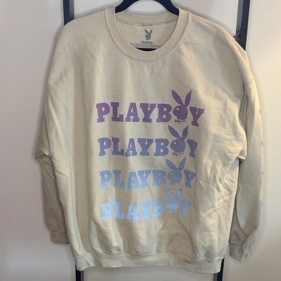 PLAYBOY Tops - Playboy Cream Sweatshirt with Purple and Blue Accents